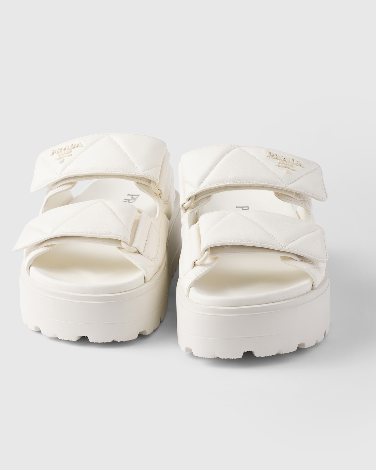 Prada Sandalias planas de napa acolchada Precio de fábrica