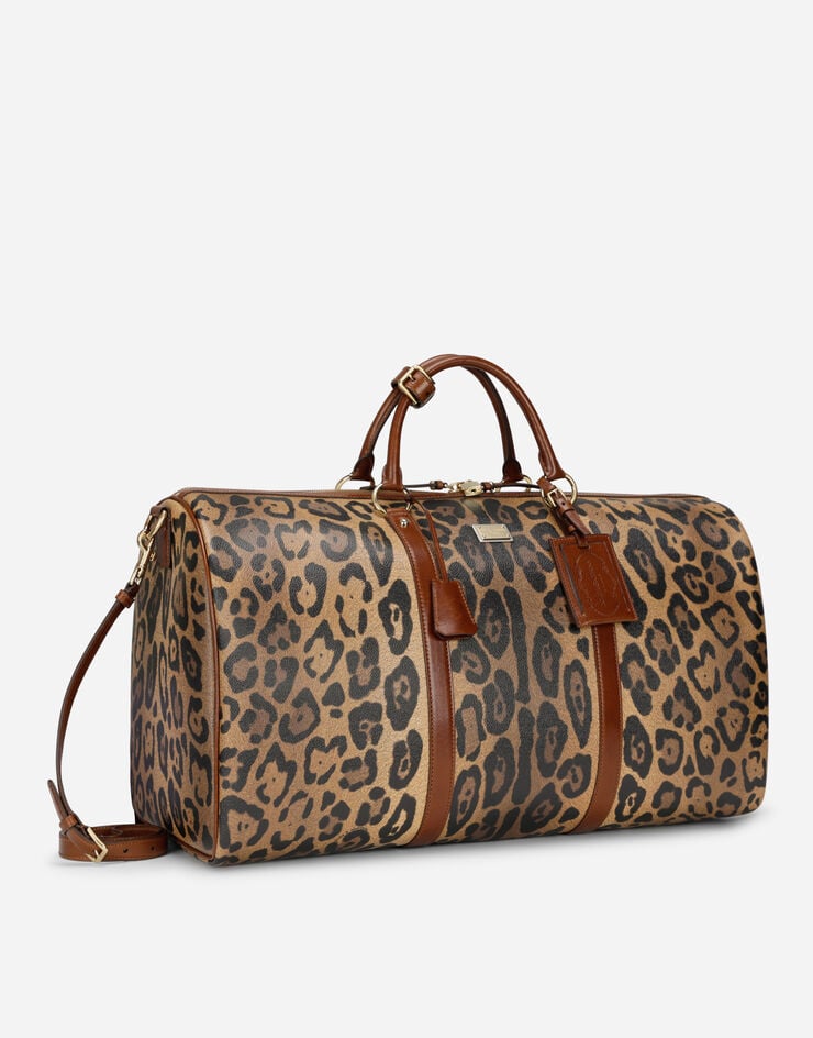 Dolce & Gabbana Bolsa de viaje mediana en crespo estampado leopardo con placa con logotipo Últimos 3 días