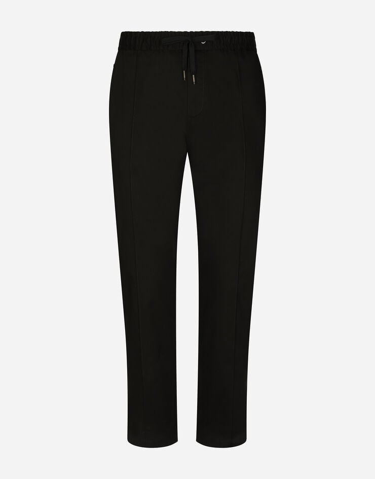Dolce & Gabbana Pantalones de chándal de algodón elástico con placa