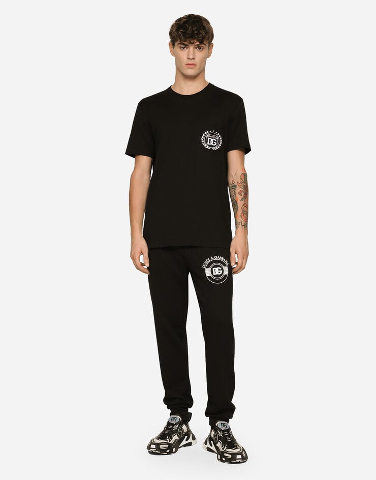 Dolce & Gabbana Pantalón de chándal en punto con estampado del logotipo DG Venta caliente