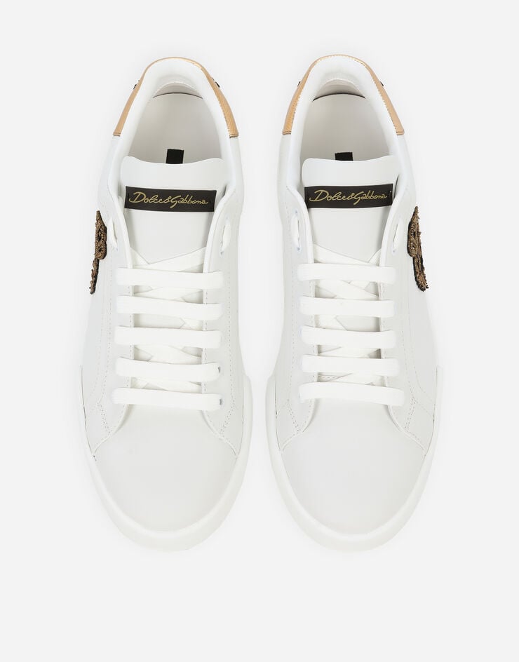 Dolce & Gabbana Zapatillas Portofino de napa de becerro estampado con parche de corona Los más vendidos