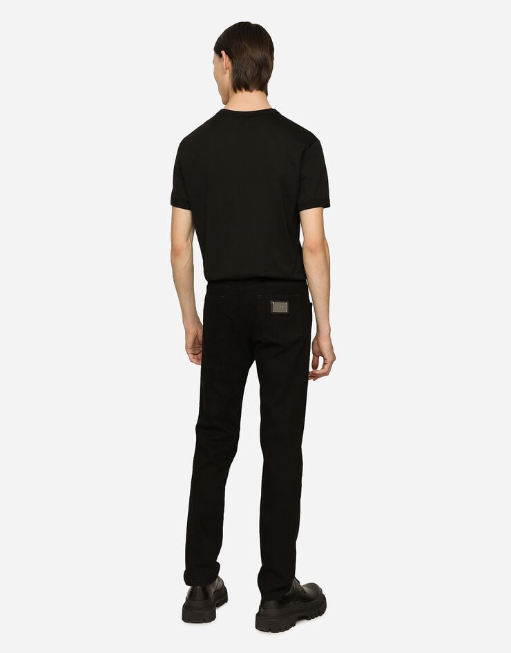 Dolce & Gabbana Vaqueros slim elásticos negros con efecto lavado Envío gratis