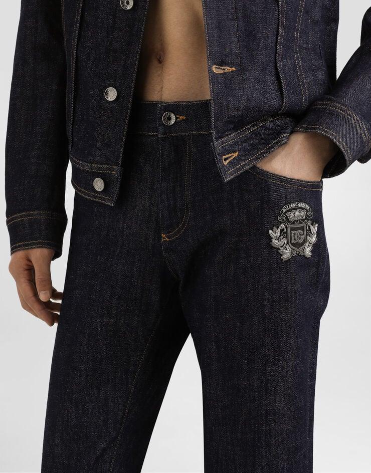 Dolce & Gabbana Vaqueros skinny de algodón elástico con parche Tienda
