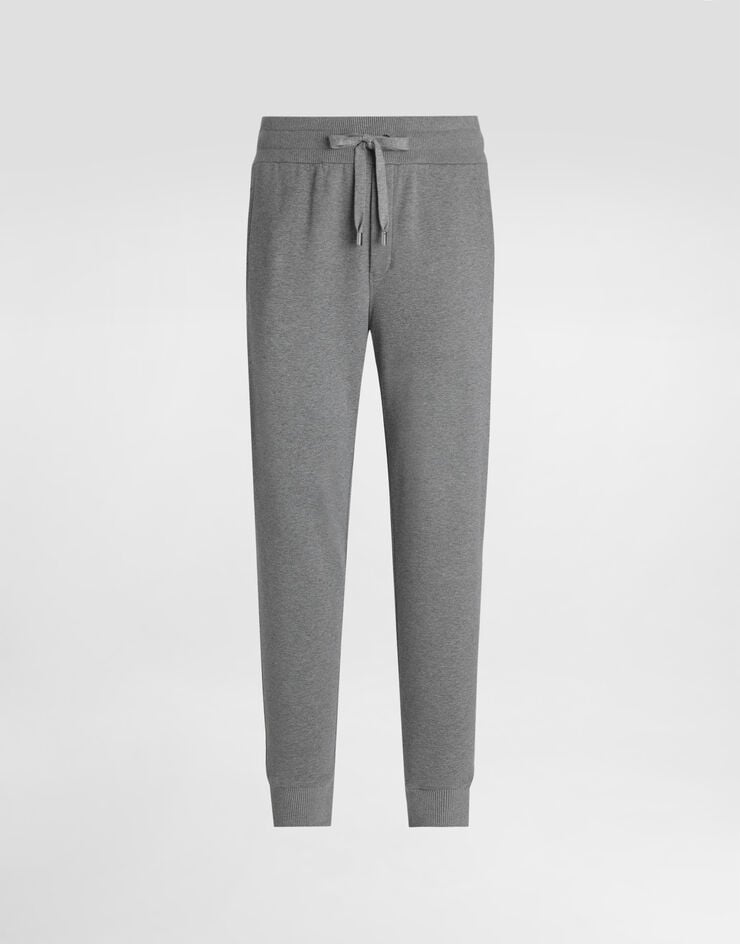 Dolce & Gabbana Pantalones de chándal en punto elástico con placa