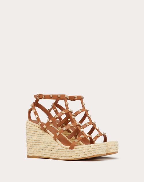Valentino SANDALIAS ROCKSTUD CON TACÓN EN CUÑA DE 95 MM Y CORREAS DE CUERO DE BECERRO Tienda