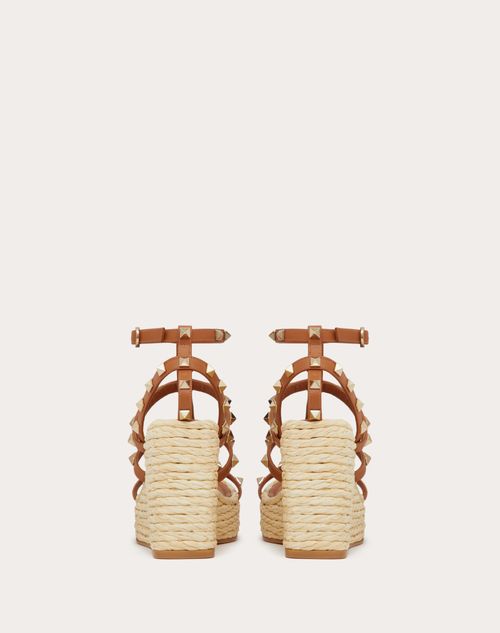 Valentino SANDALIAS ROCKSTUD CON TACÓN EN CUÑA DE 95 MM Y CORREAS DE CUERO DE BECERRO Tienda