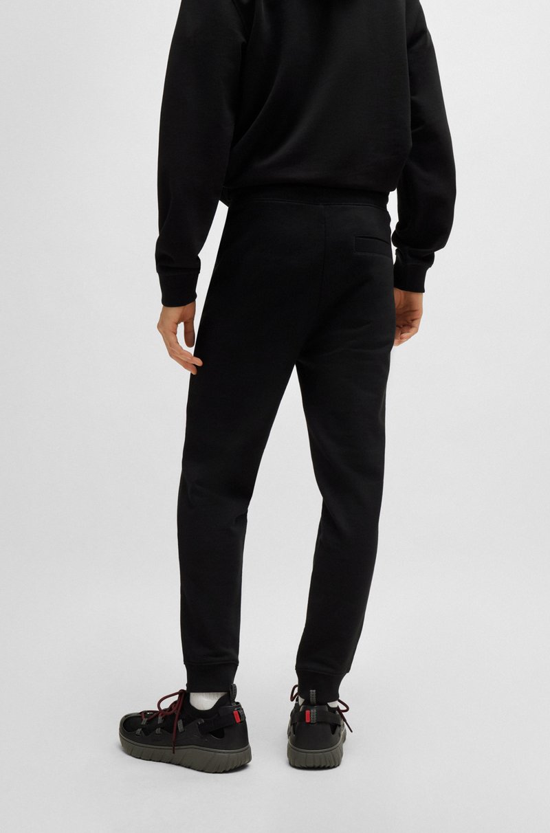 Hugo Boss Pantalones de chándal en felpa de algodón con etiqueta con logo roja Ofertas