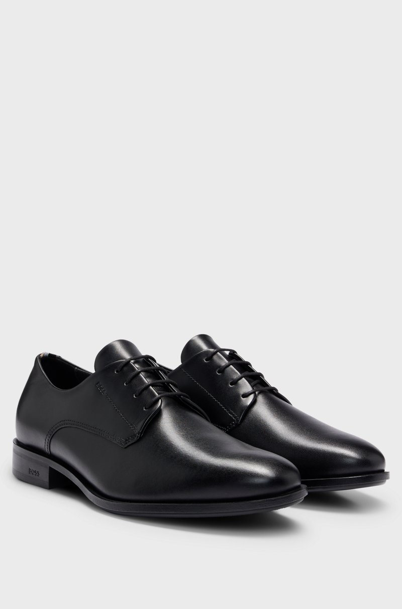 Hugo Boss Zapatos Derby de piel con ribetes de la marca