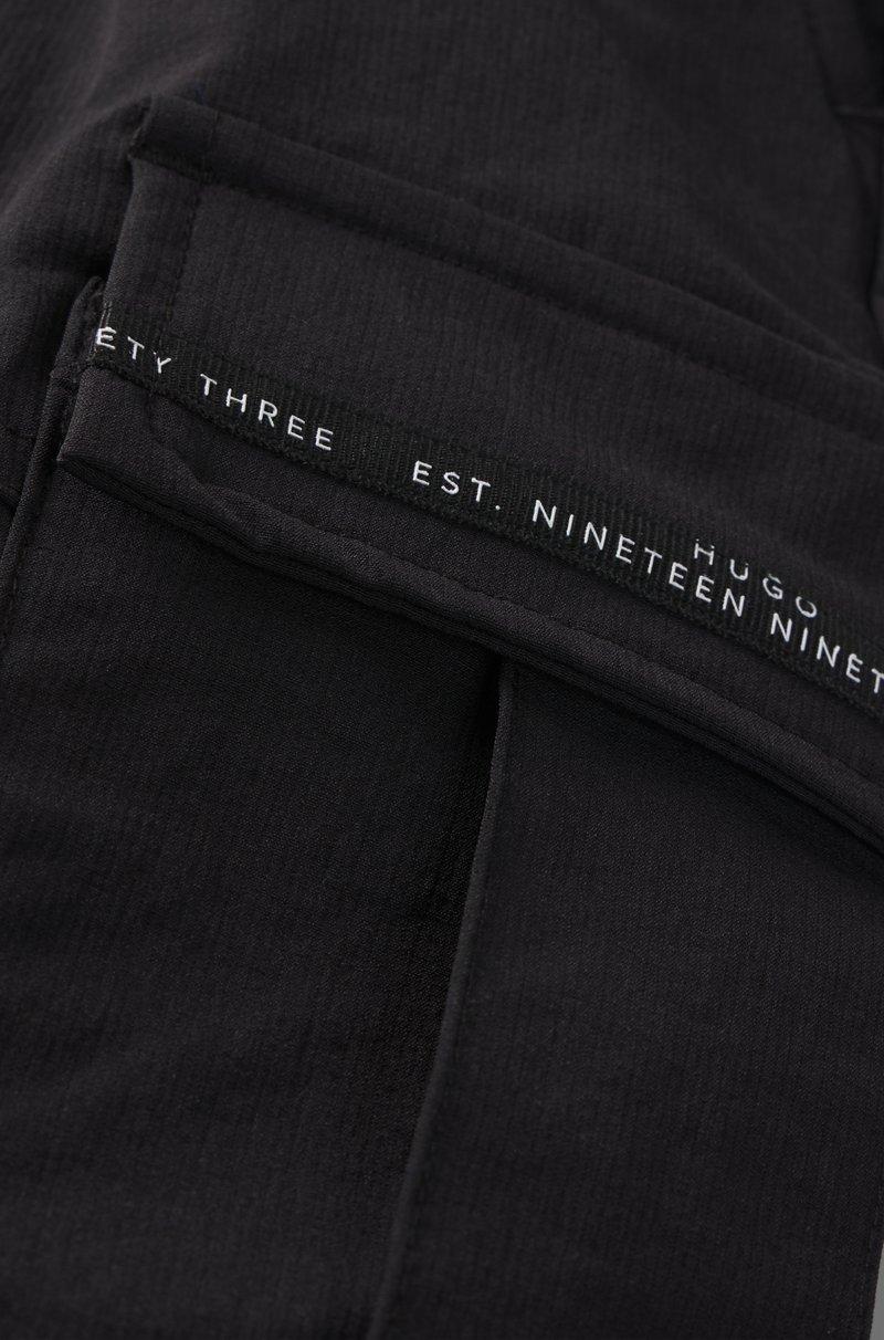 Hugo Boss Pantalones cargo para niños con ribetes de bolsillo de la marca Outlet