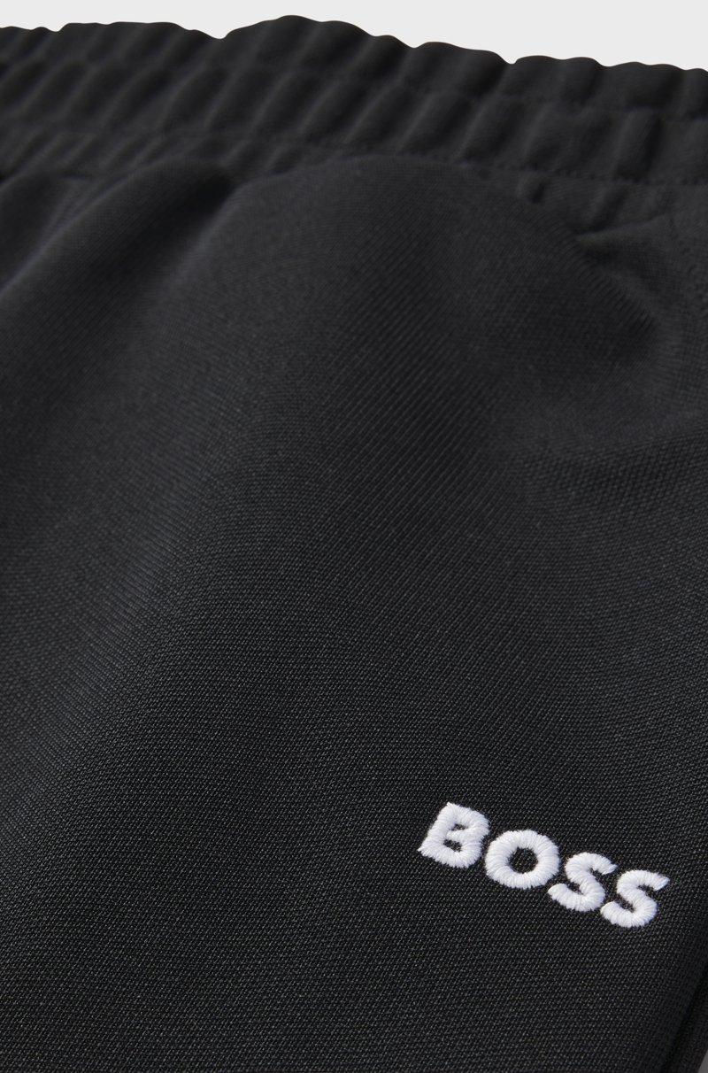 Hugo Boss Pantalones de chándal tapered fit para niños con ribetes de espiga Rebajas de fábrica
