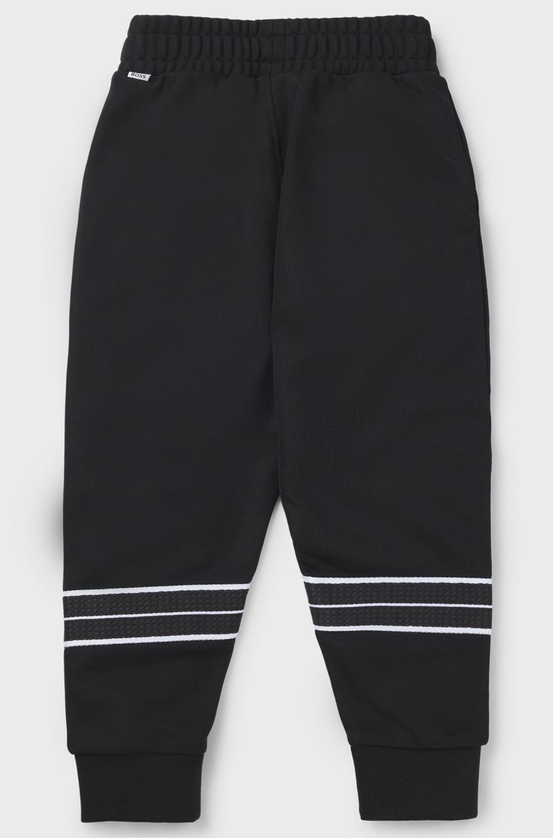 Hugo Boss Pantalones de chándal tapered fit para niños con ribetes de espiga Rebajas de fábrica