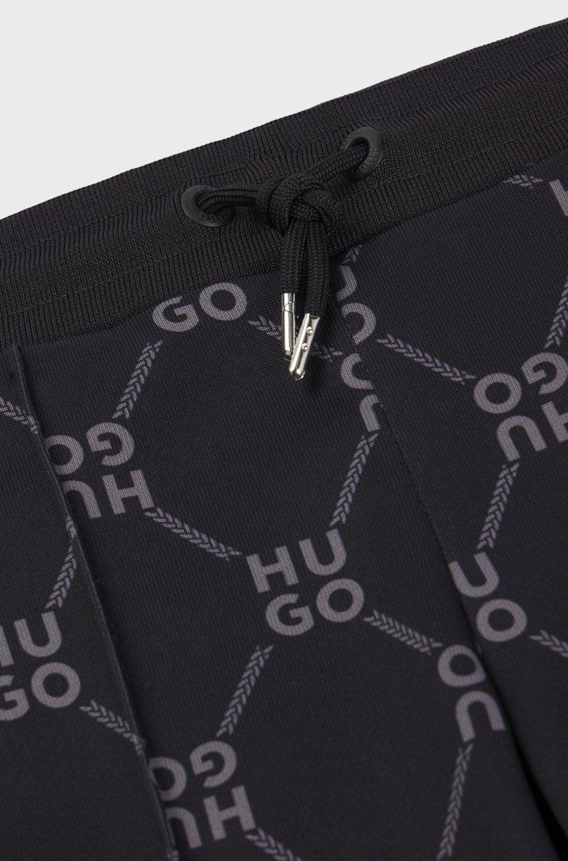 Hugo Boss Pantalones de chándal loose fit para niños con logo apilado estampado ÚLTIMAS EDICIONES