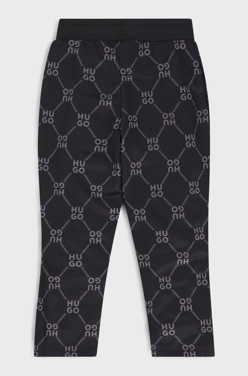 Hugo Boss Pantalones de chándal loose fit para niños con logo apilado estampado ÚLTIMAS EDICIONES