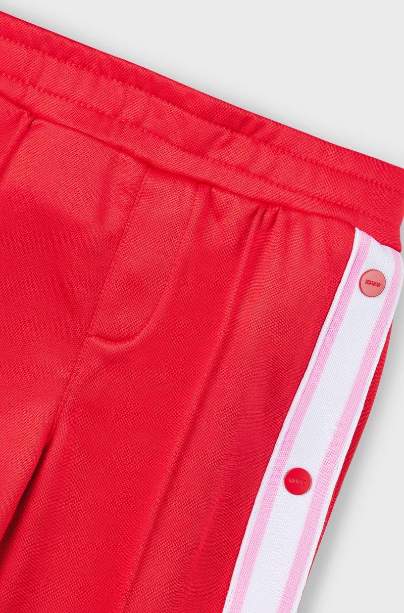 Hugo Boss Pantalones de chándal para niños con botones automáticos en las costuras laterales Ofertas
