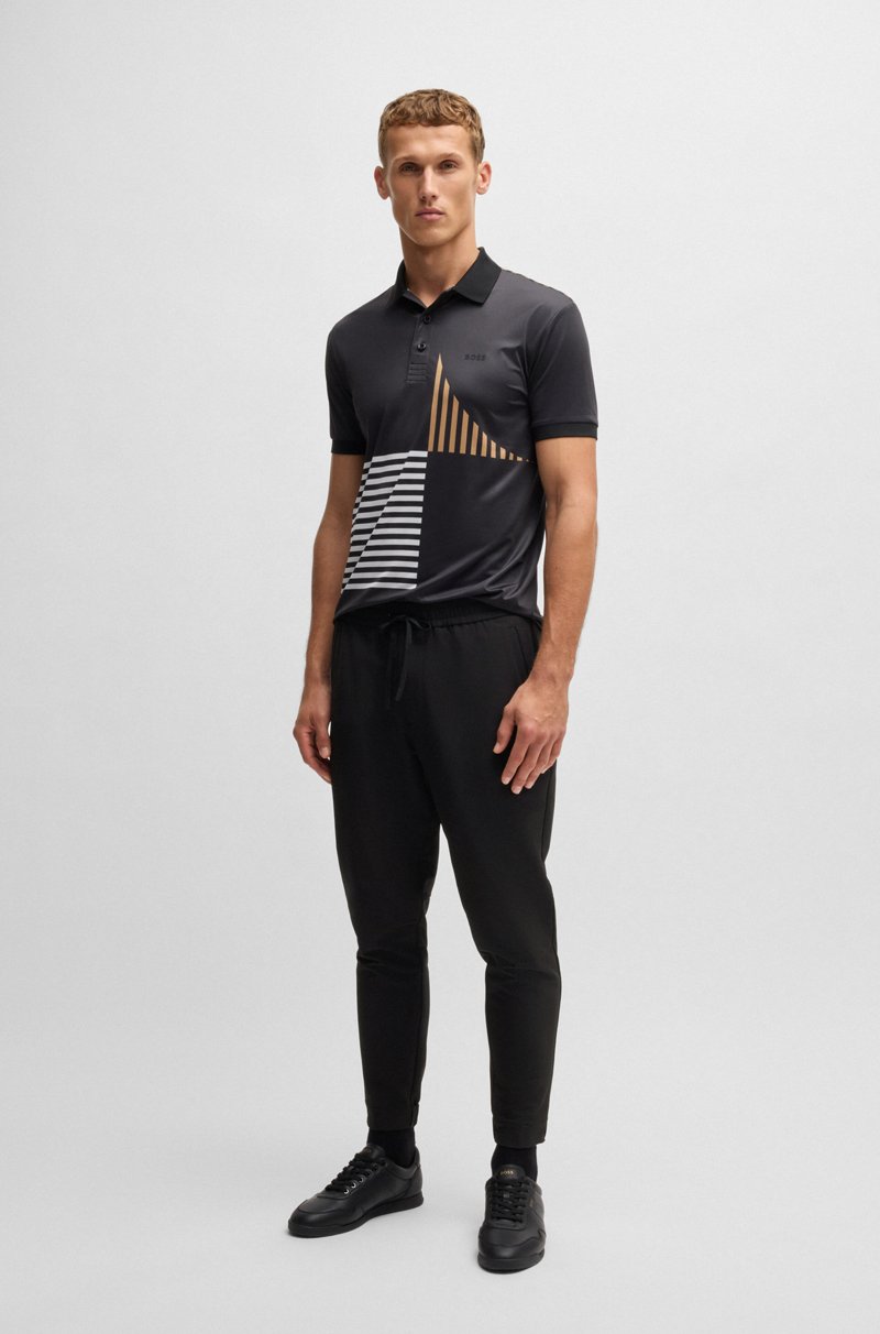 Hugo Boss Pantalones tapered fit de tejido elástico repelente al agua Descuentos del mes