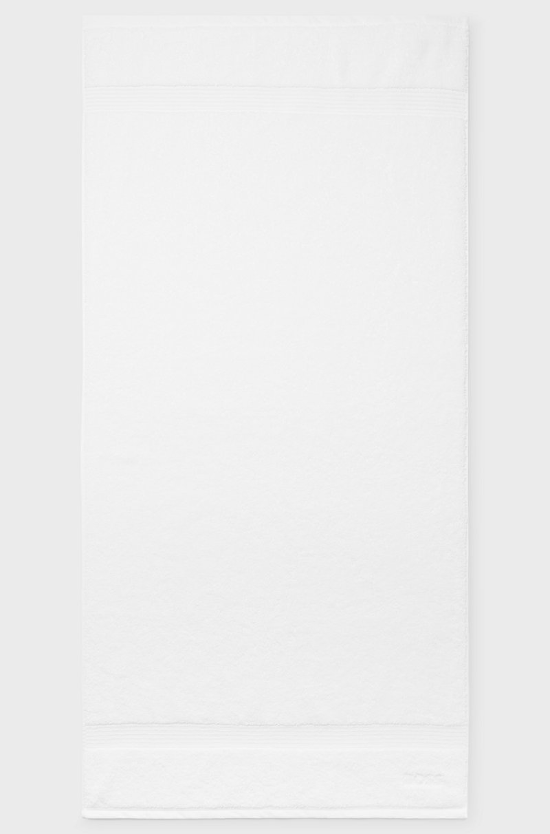 Hugo Boss Toalla de baño blanca de algodón del Egeo con logo tonal Descuentos del mes