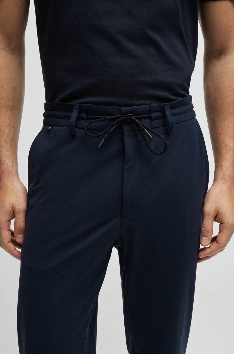 Hugo Boss Pantalones slim fit de punto técnico elástico Ahorra y exporta