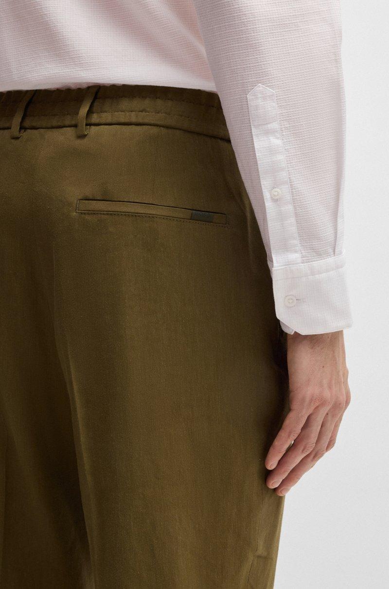 Hugo Boss Pantalones tapered fit en mezcla de lino En oferta