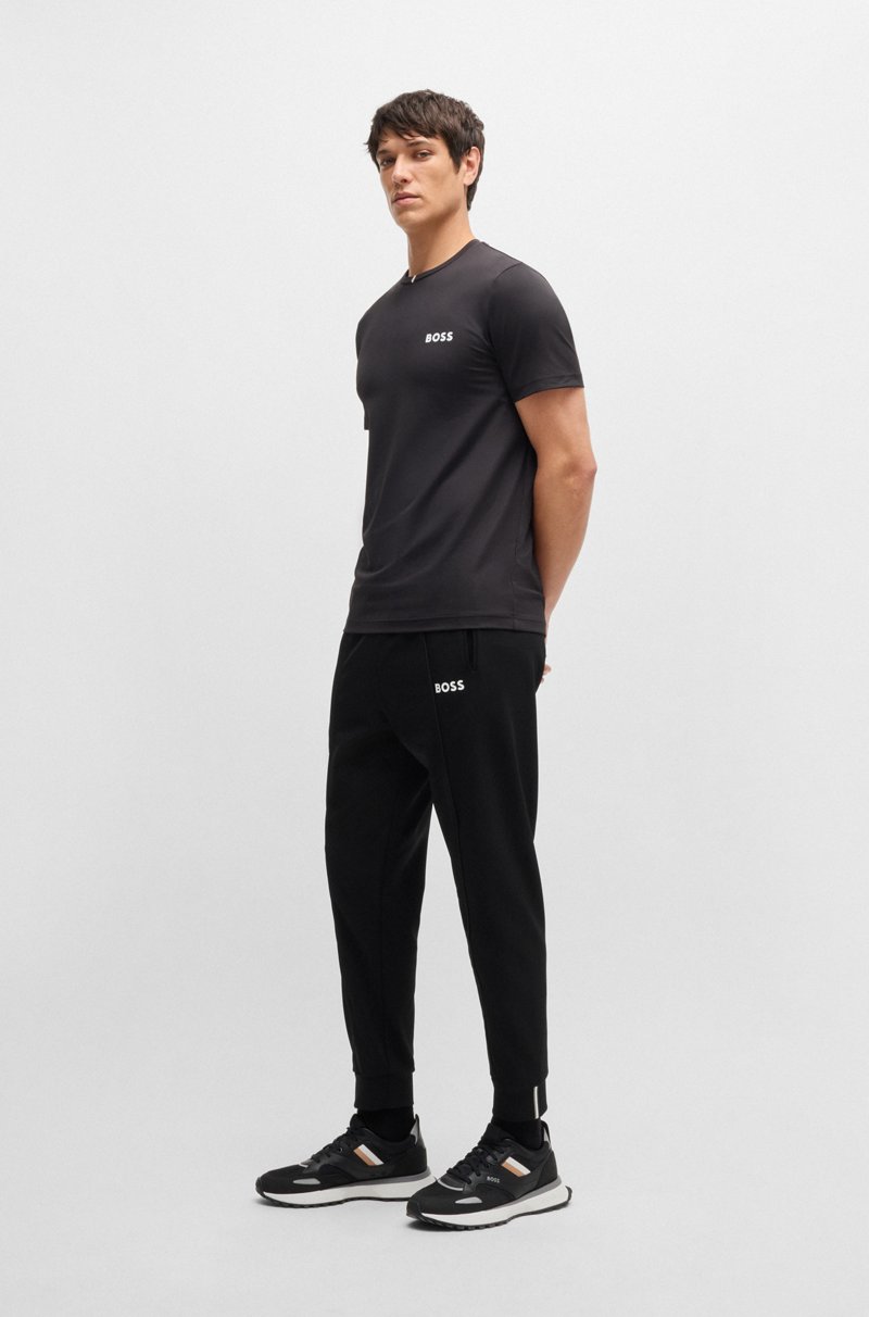 Hugo Boss Pantalones regular fit en tejido de gabardina elástico con detalle de logo Ofertas de temporada