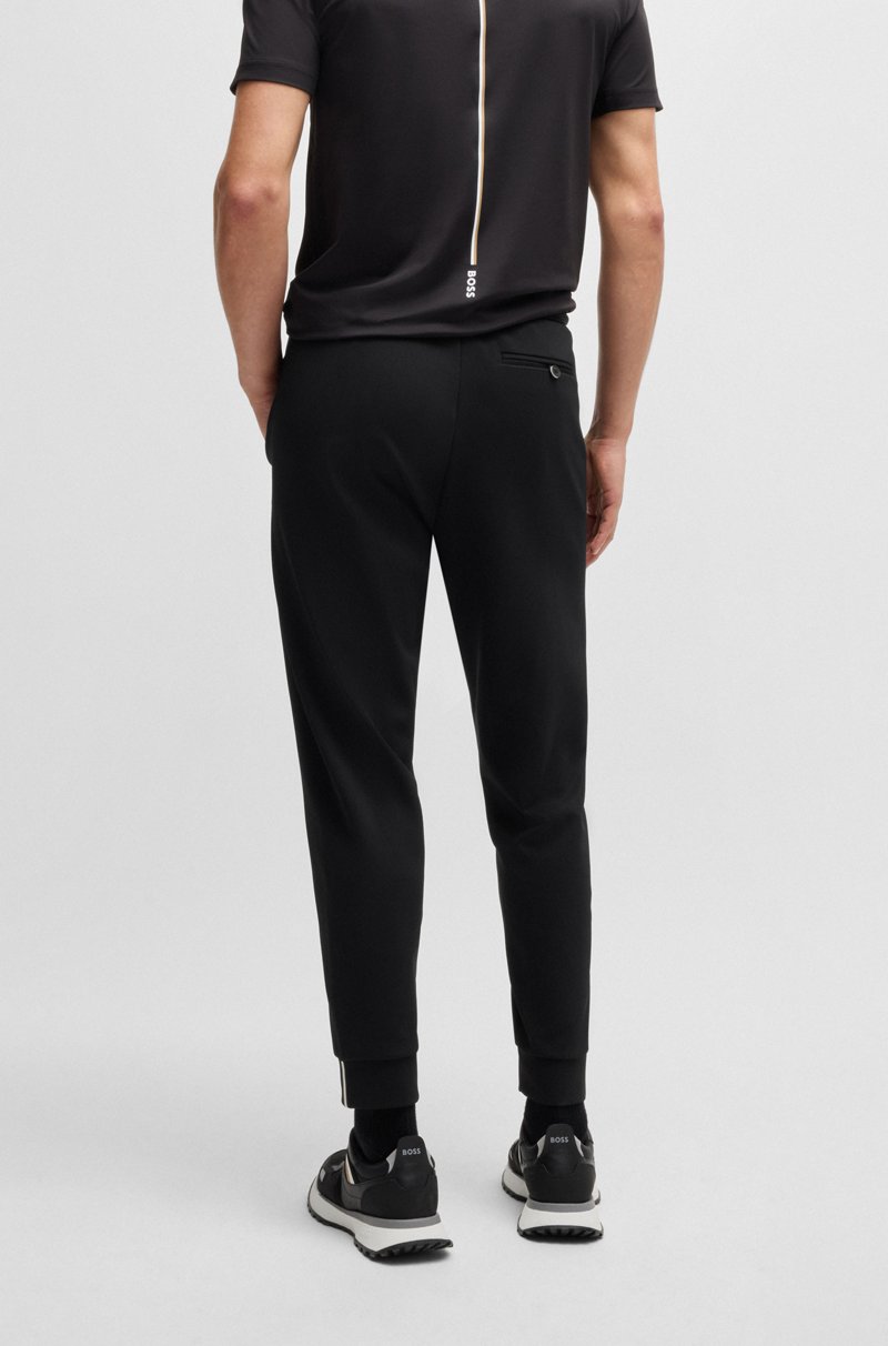 Hugo Boss Pantalones regular fit en tejido de gabardina elástico con detalle de logo Ofertas de temporada