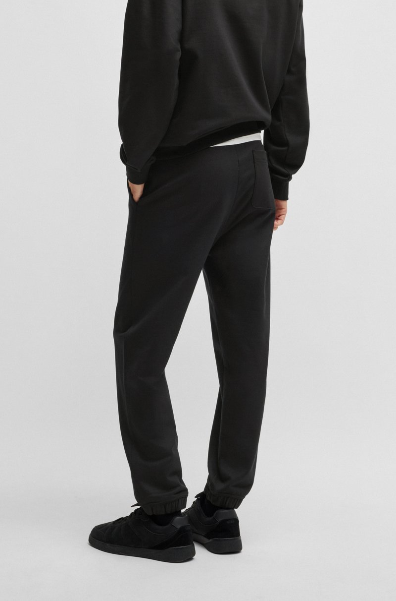 Hugo Boss Pantalones de chándal en felpa de algodón con logo ahumado Precio ultrabajo