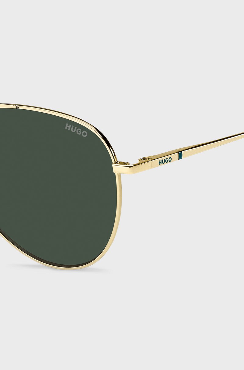 Hugo Boss Gafas de sol de doble puente con montura metálica en tono dorado Última moda