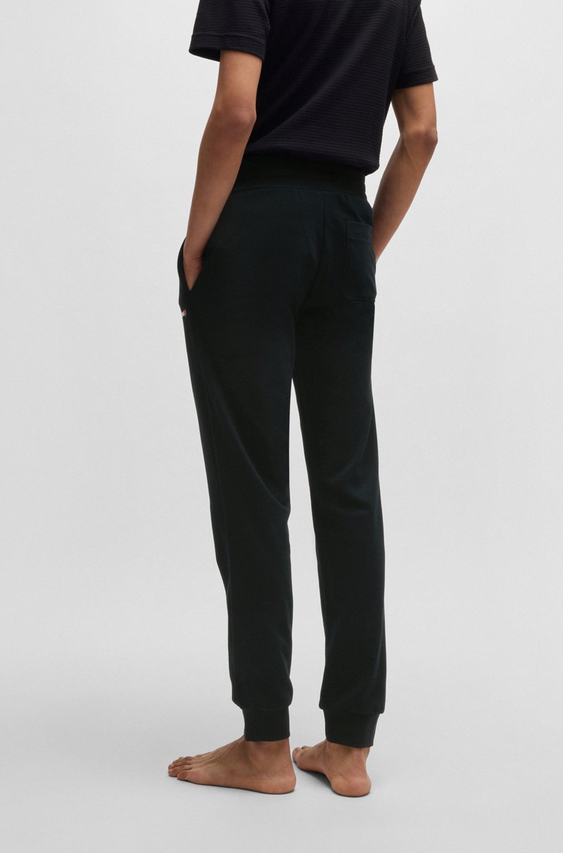Hugo Boss Pantalones de chándal en mezcla de algodón con logo de corazón Precio de fábrica