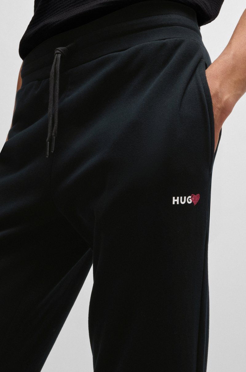 Hugo Boss Pantalones de chándal en mezcla de algodón con logo de corazón Precio de fábrica