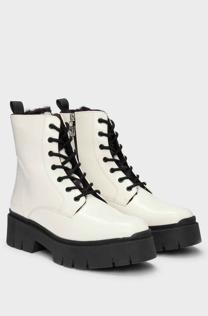 Hugo Boss Botas de piel sintética con logo en el cursor de la cremallera Descuento