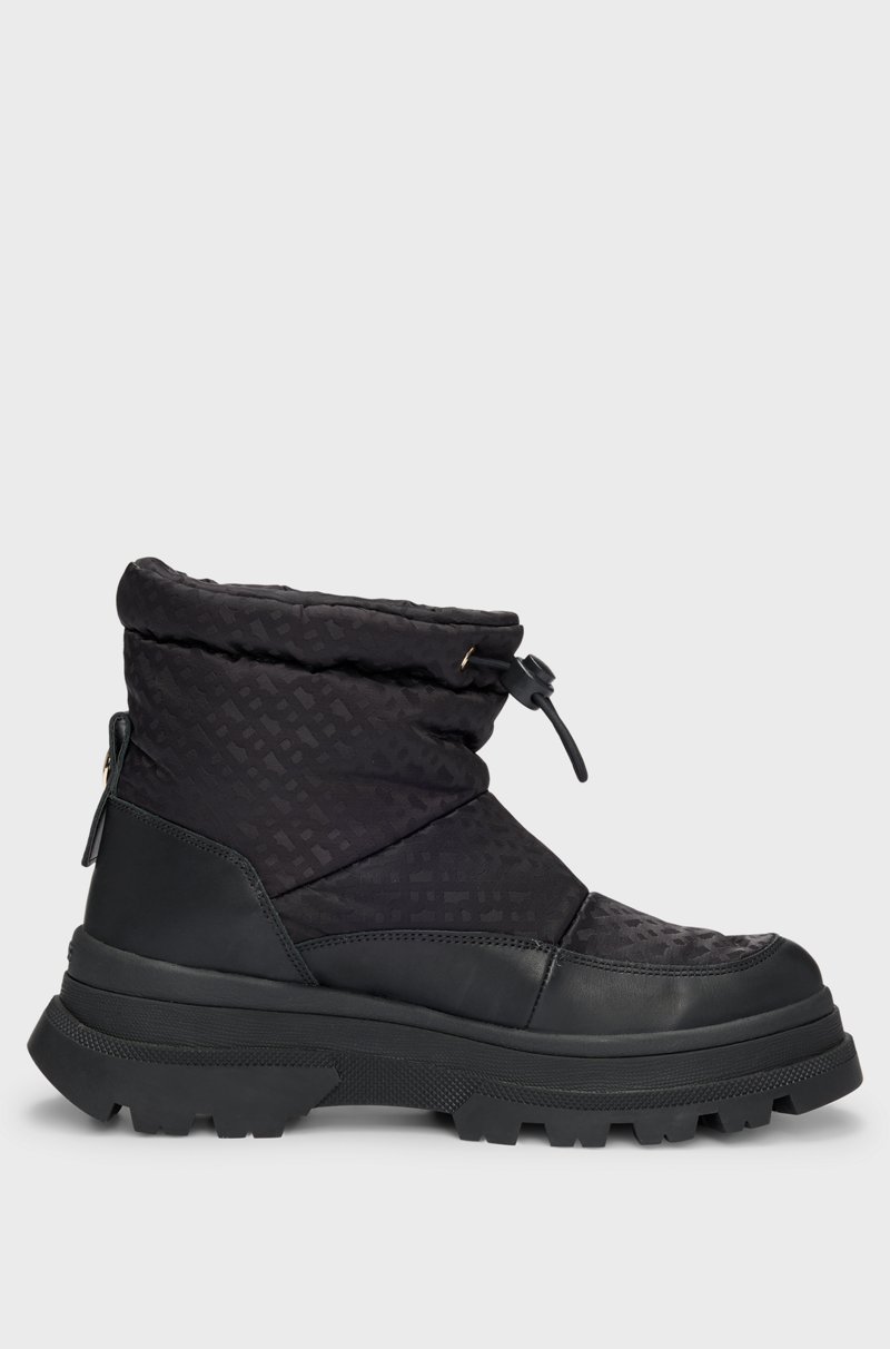 Hugo Boss Botas slim fit con motivo de monogramas y apliques de piel Envío gratis