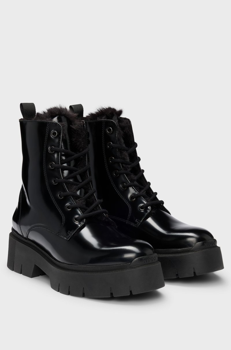 Hugo Boss Botas de piel sintética con logo en el cursor de la cremallera