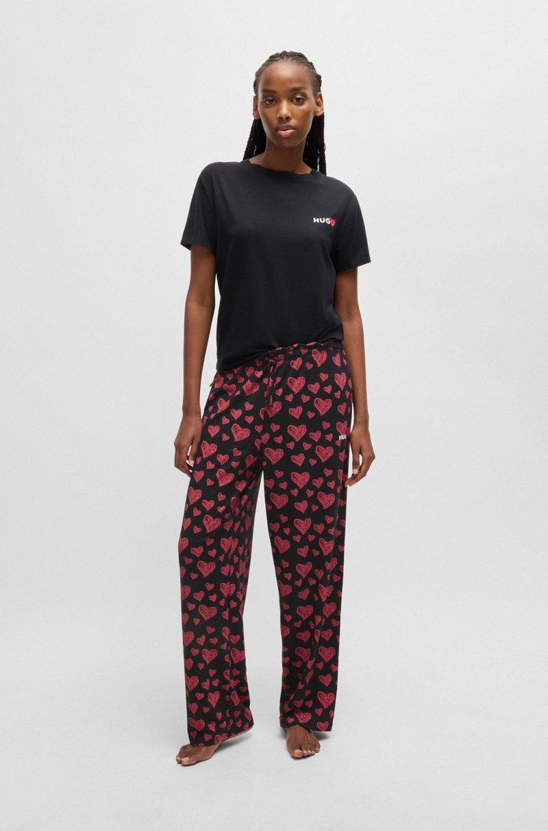 Hugo Boss Pantalones de pijama de punto de mezcla de modal con estampado integral de corazones Outlet
