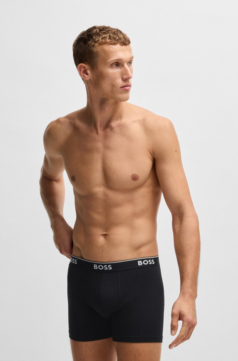Hugo Boss Paquete de tres calzoncillos bóxer en algodón elástico con logos Solo hoy