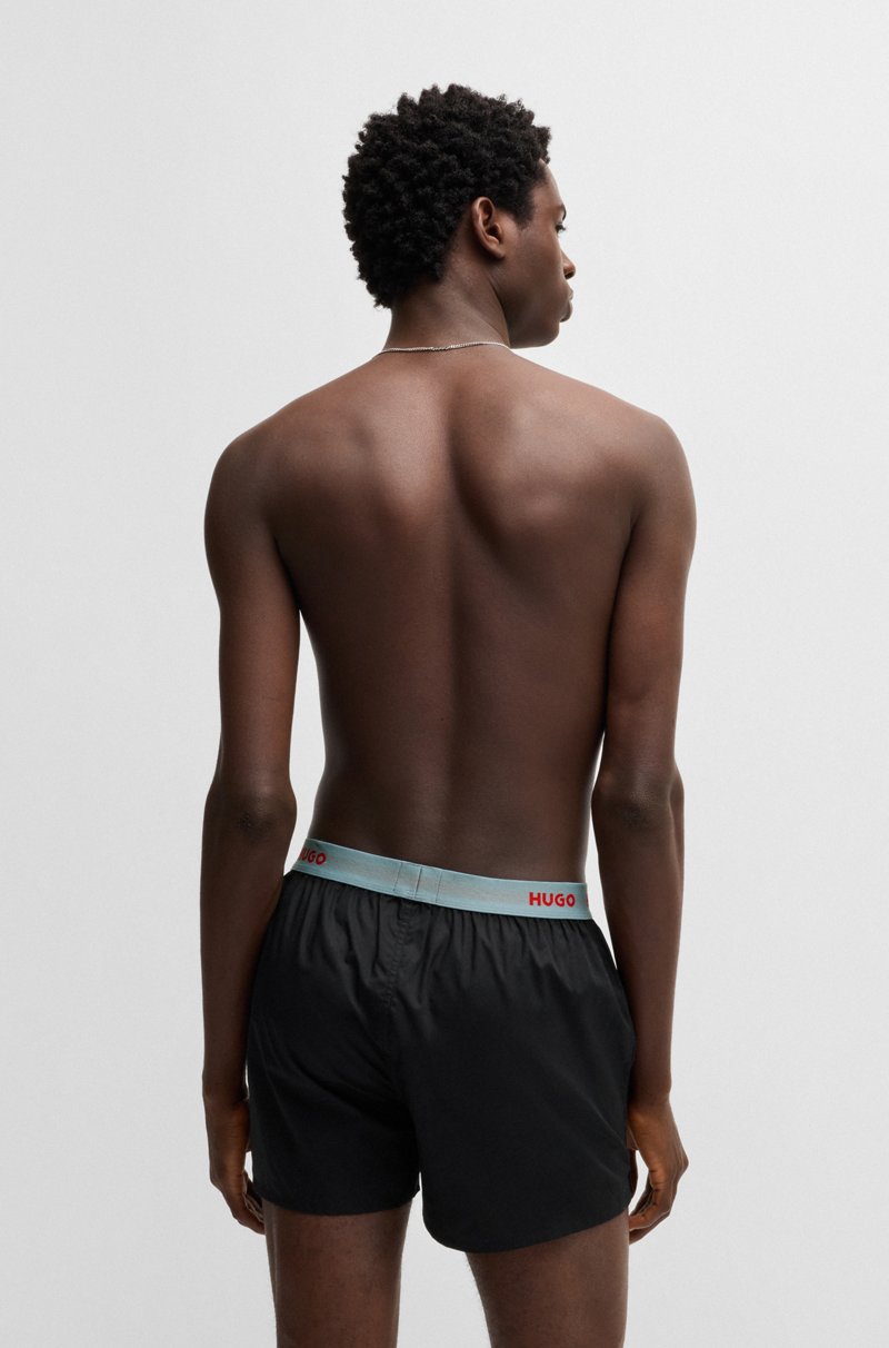 Hugo Boss Paquete de tres calzoncillos bóxer de algodón con logos en la cintura Envío internacional gratuito