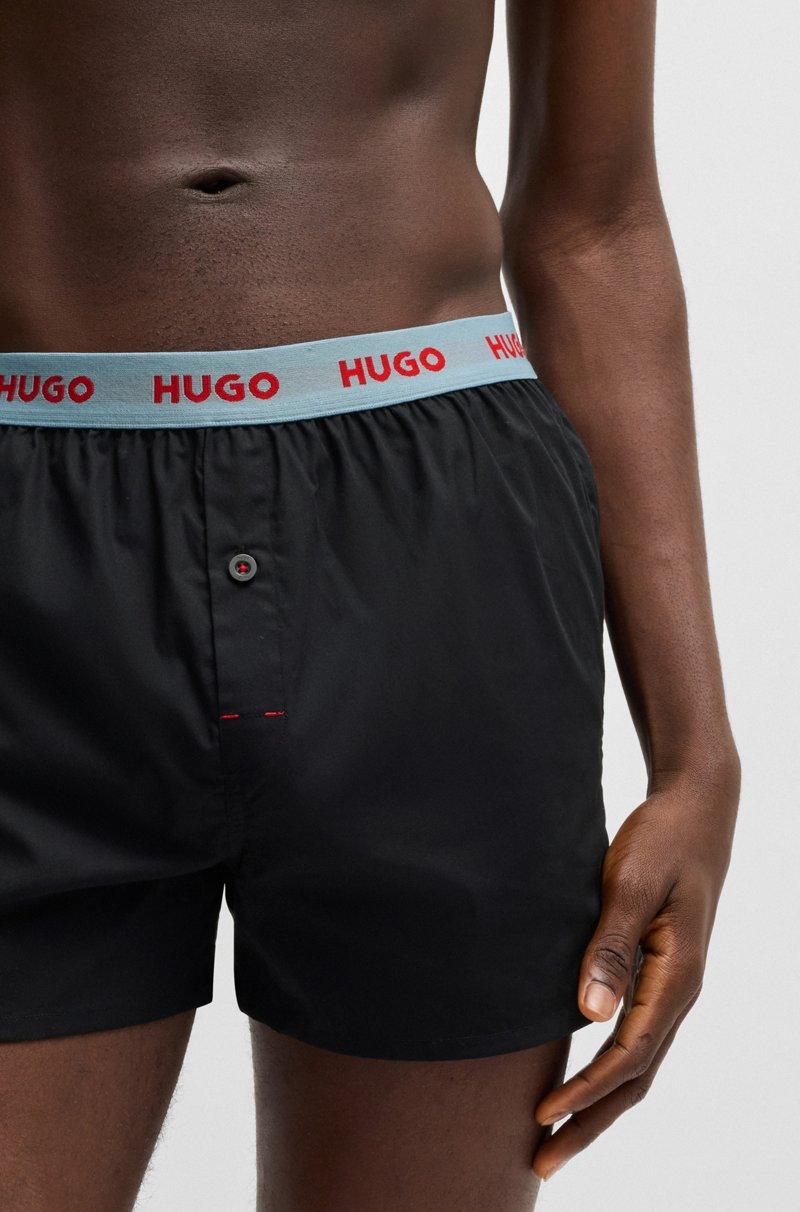 Hugo Boss Paquete de tres calzoncillos bóxer de algodón con logos en la cintura Envío internacional gratuito