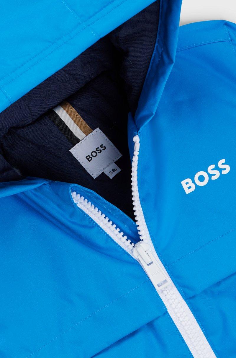 Hugo Boss Cazadora cortavientos para niños con bloques de color y estampado de monogramas que aparece con el agua Promoción trimestral