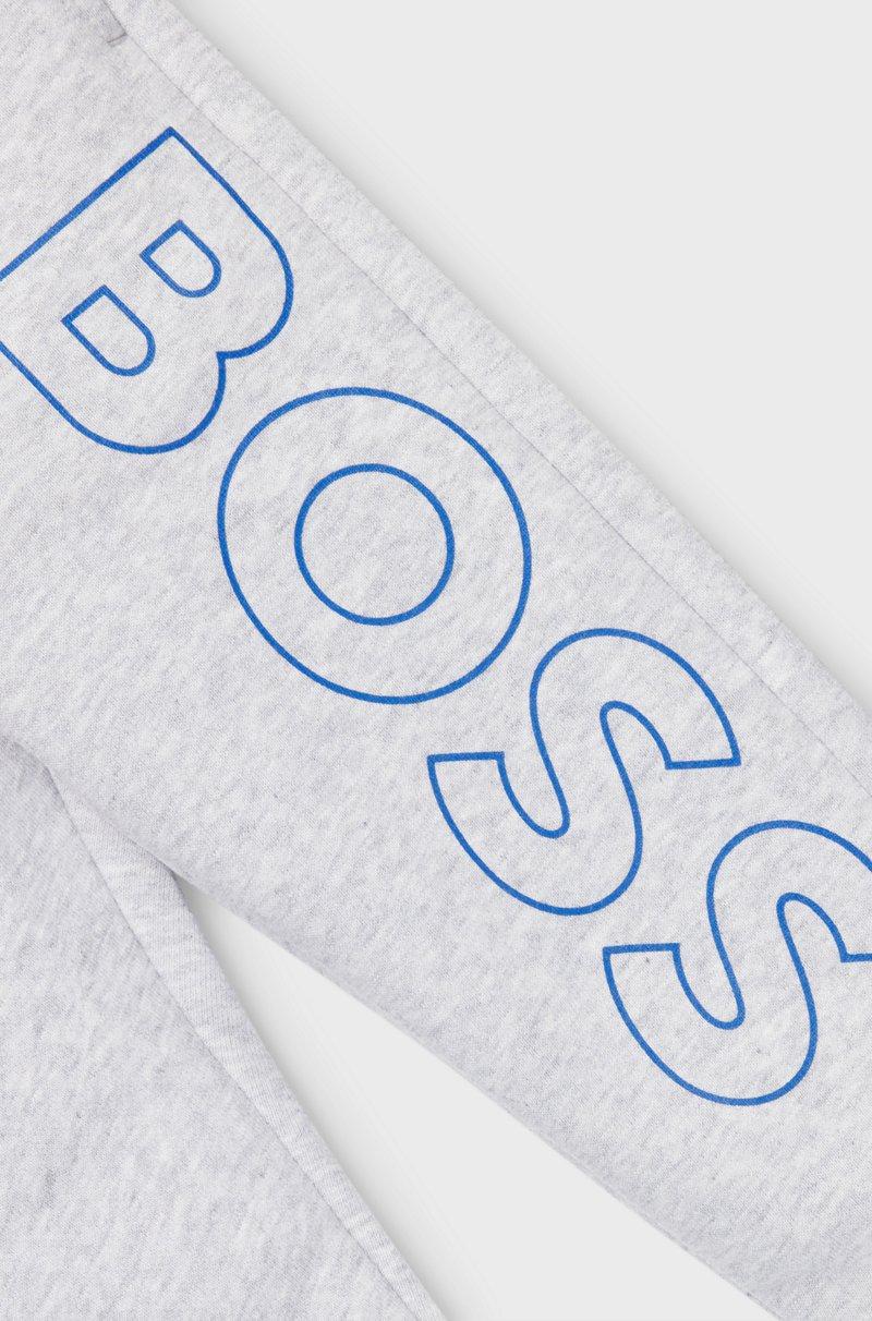 Hugo Boss Pantalones de chándal para niños en algodón con logo vertical estampado Última moda