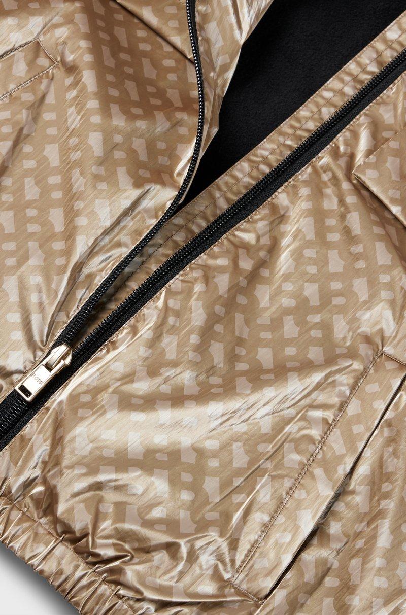 Hugo Boss Cazadora cortavientos con capucha para niños con estampado de monograma Último día